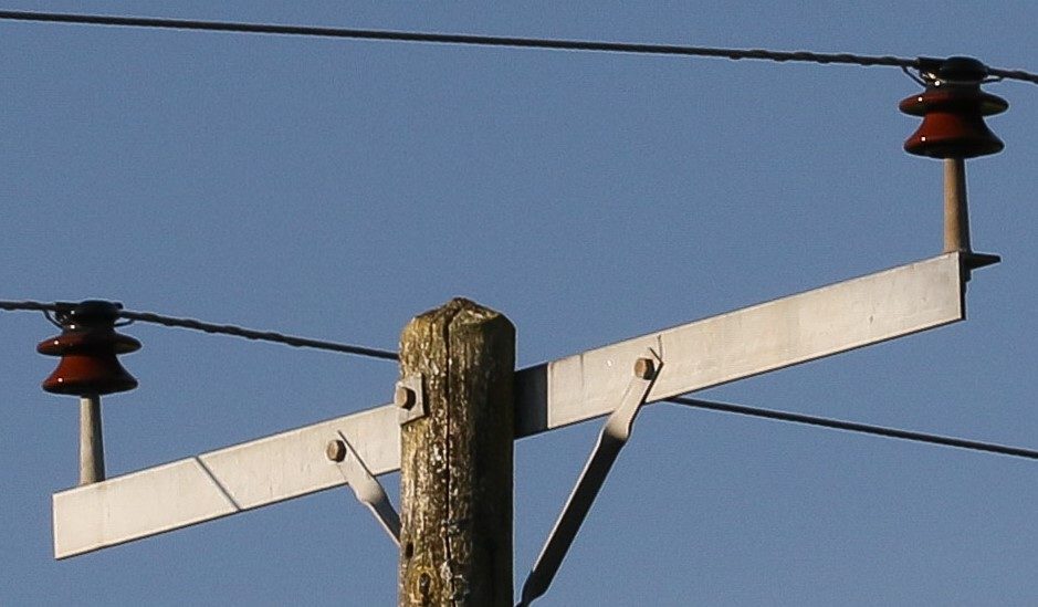 Insulator pins manufactured by B.B. Price in use on an overhead power line