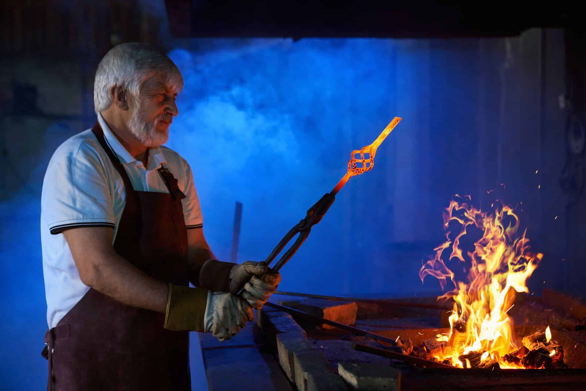History of forging - blacksmith forging by hand