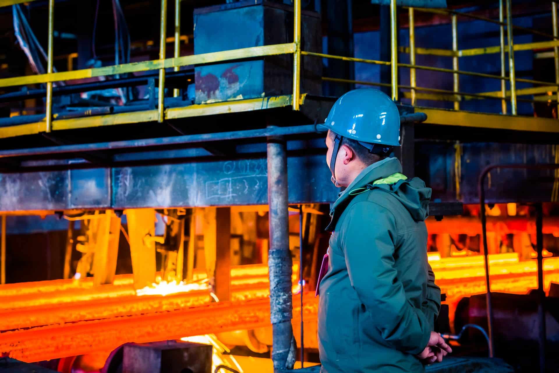 B.B. Price "metal workers near me" observing the forging process