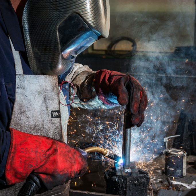 A B.B. Price worker welding
