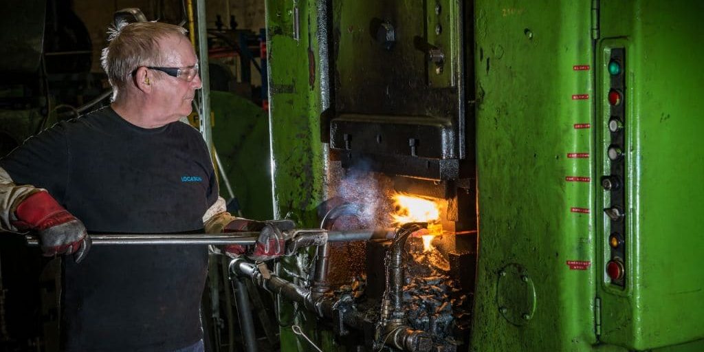 A B.B. Price forgemaster offering forging near me services at a hot forge